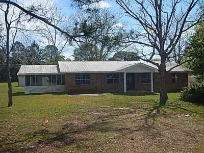Property sold in its AS-IS, WHERE-IS condition. 3 Bedroom, 1 Bath located in Laurel Hill, FL. Property is located in a farming community. Home has tin roofing and brick exterior. Sheetrock need repairs in some spots and carpet needs to be cleaned or replaced. Roof needs repair. Home has central air and property sits on 1 acre! Floor coverings are needed and kitchen and bathroom need updates. Other repairs may be necessary before move in ready. Great potential!
