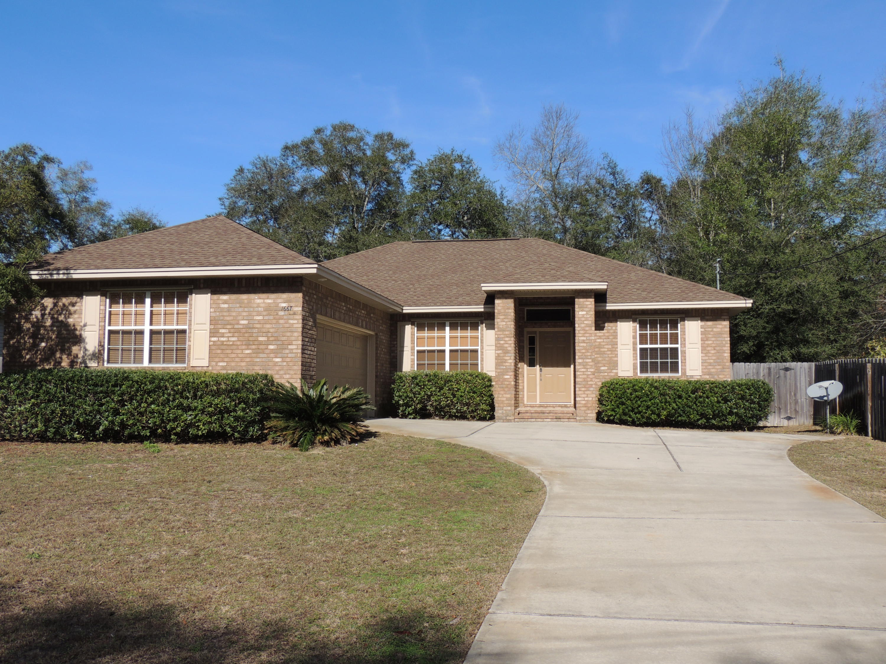 Welcome home to a clean brick custom-built Gary Miller home with oversized garage and parking, and privacy fenced back yard with room for a pool. This quality home is neutral in colors, with top of the line cabinetry, plenty of pantry space, and hurricane panels for the windows. Upon entering, you will see a custom tiled foyer, with two bedrooms to the right. On the left is formal dining area with bullnose corners and crown molding. The kitchen is spacious with room for a table and gorgeous cabinets.