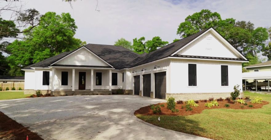 Under Construction-Presale At 3103 SQ FT with 4 bedroom, 4 bathroom plus dedicated office AND a 3-car garage. This luxurious brand new custom built Contemporary Craftsmen home has been impeccably designed for quality spacious living. The floor plan has a flowing layout which is highlighted by classic finishes, large windows and doors to bathe the space in natural light. The beautiful entryway leads into the open great room and fabulous chef's kitchen, quartz counters, 9 ft center island, solid custom wood cabinets, walk in pantry and GE Cafe Appliances -- Enjoy entertaining guests or coming together for family gatherings. Wisconsin Walnut engineered wood floors in the main areas creates a  warm and inviting atmosphere. French doors leading  to the 10x44 covered back
