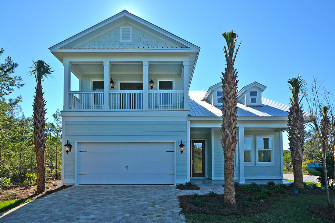 New 4 bedroom home with over 2,200 sq ft. in secure gated subdivision that is walking distance to the Gulf. The great room has 18 ft. ceilings. Home is currently under construction. There is a beautiful Community Pool and Clubhouse and cobblestone roads make this a truly charming new neighborhood.