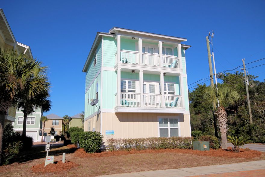 Toes in the Sand! Three story Beach House located just off tony County Highway 30A. Minutes from the Gulf of Mexico, third story balcony boasts views of the Gulf. Vacation Rental home has Four Bedrooms, each room has it's own bath plus a 1/2 bath on second floor. Hardwood flooring throughout for beauty and ease of maintenance. Kitchen, dining and living area are open and located on the 2nd floor. Beautiful kitchen features upgraded cabinetry, granite counters and breakfast bar, open shelves displaying artistic dishes and glassware, stainless steel appliances and pendant lighting. Natural light is abundant throughout this delightful home. Contemporary decor lends itself to Relaxation! Open floor plan with French doors leading to balcony on 2nd floor to enjoy the Salt Air Breeze.