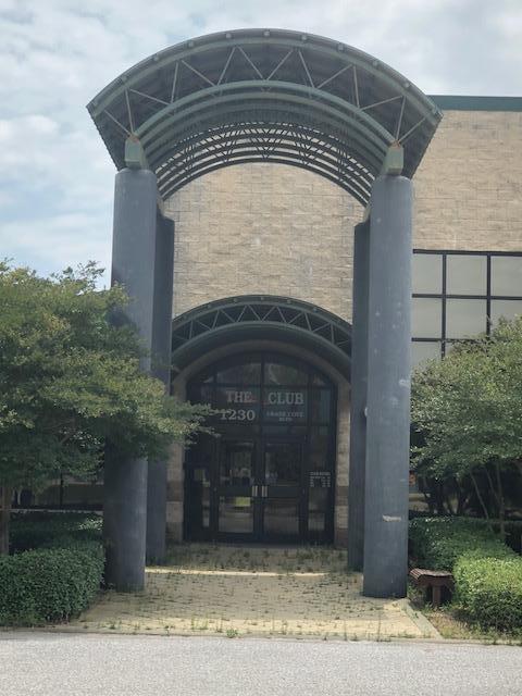 The property used to operate as a Health, Fitness, Tennis, Physical Therapy, and Medical Facility that was formerly owner occupied who also leased all of the medical and physical therapy space to Sacred Heart Hospital. The subject property consists of 41,151 sqft of heated and cooled space with several office suites, bathrooms, shower, and locker room facilities, indoor and outdoor Olympic size pools, and large second floor fitness, yoga, and spin cycle area looking over a large interior atrium and outdoor (Hydro Grid Clay) tennis courts.
