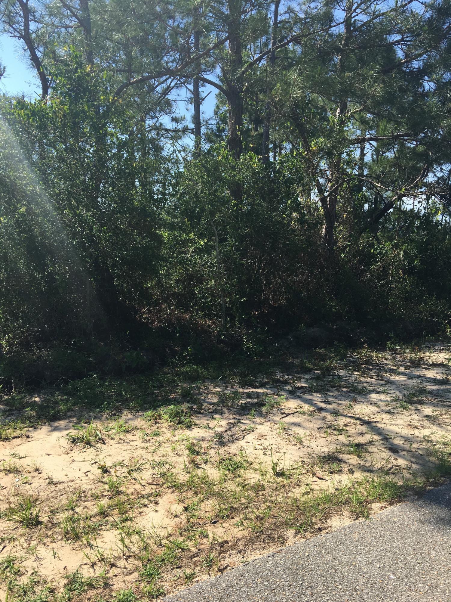 Lot 1, Block E, Sea Pines s/d and southerly 1/2 of adjacent ROW (vacated) Bayview CT adjacent to lot - Land