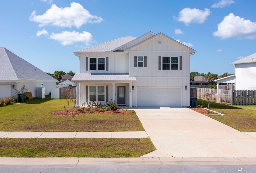 Price Reduced! Exceptional value for a 5-bedroom, 3-bath home in PCB! Needs fresh paint and minor repairs. This home features a spacious open family room flowing into the dining area and back porch -- perfect for entertaining or relaxing. The kitchen is conveniently located at the entryway. Downstairs includes a guest bedroom with a nearby full bath. Upstairs, a large bonus room connects three more bedrooms, and the primary suite offers a double vanity, walk-in closet, and separate garden tub and shower. Just 1 mile from Panama City Beach and close to shopping, dining, and entertainment. schedule a showing today!