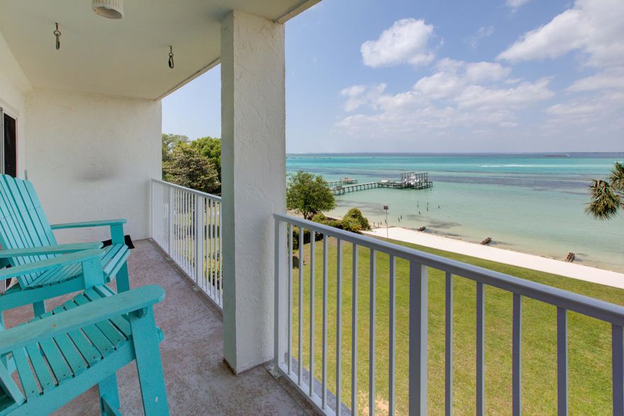 RARE. Condos in The Valencia are not presented to the market often. This is your chance to own in a waterfront condo without short-term renters crowding your personal space. Unobstructed views from your expansive private balcony overlook the stunning Choctawhatchee bay and east pass. The unit has many updates to bring the look and feel up to date. Views of the water can be seen from nearly everywhere in the condo. The building offers a long pier for parking boats when loading up for day trips to Crab Island. Only half a mile from the Destin Harbor. A private waterfront community pool allows you and guests to relax by the water. Additionally, the property offers a beach area for launching kayaks or paddle boards.
