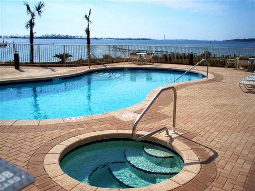 Recently approved for VA financing and only 1 mile from Hurlbert Field entrance this gated community is a great place to live with lush landscaping and direct access to the large swimming pool, hot tub, dock and Santa Rosa Sound (TH not directly on Sound). Enjoy fishing and magnificent sunsets. There is a recreational area with picnic tables and BBQ grills. Downstairs has a kitchen with granite counter tops, open to the family room and breakfast nook and patio access. There is also a half bath downstairs and a single car garage. Upstairs has 2 master suites with large walk in closets, in suite bathrooms, cultured marble vanities and hallway closet with washer/dryer connection. Also an excellent investment - current rental is $1,250/mo. These photos are of a duplicate unit # C.