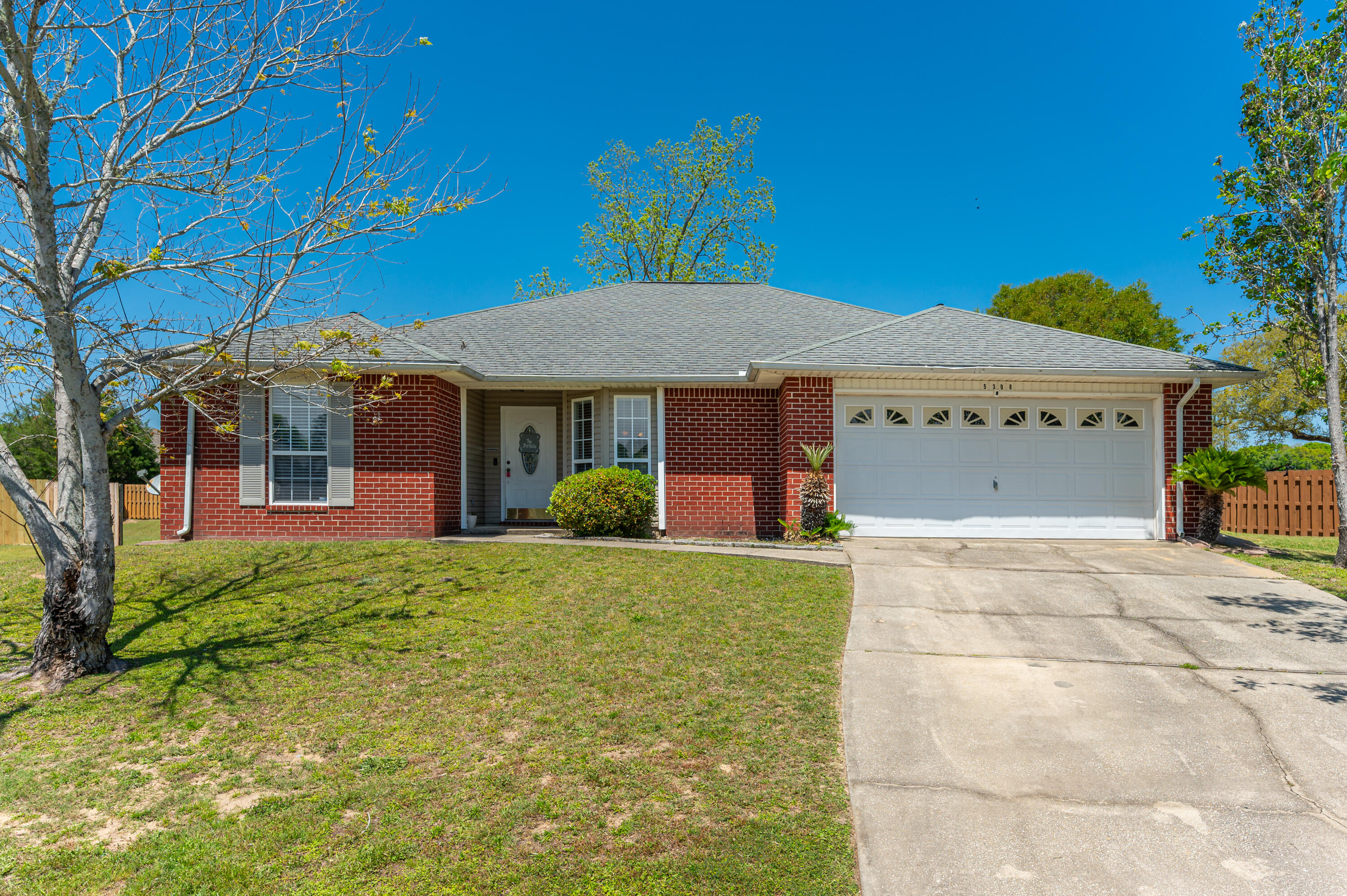 Comfy home on a Cul-de-Sac in Lee Farm! This all-brick home sits at the end of a quiet cul-de-sac in the front phase of Lee Farm. With 4 bedrooms, 2 full baths, and 1752 sqft of space, there's plenty of room to enjoy! Super functional layout, kitchen has plenty of cabinets, pantry and a pass-through window to the dining area for serving or keeping an eye on things while cooking. Light & bright with plenty of windows, sliding door off the living room leads to the covered patio and the large, fenced backyard. Perfect for relaxing, kids playing or hosting a BBQ. If you are looking for space, comfort, and a great location-this one's worth checking out! Sellers are offering a flooring allowance.