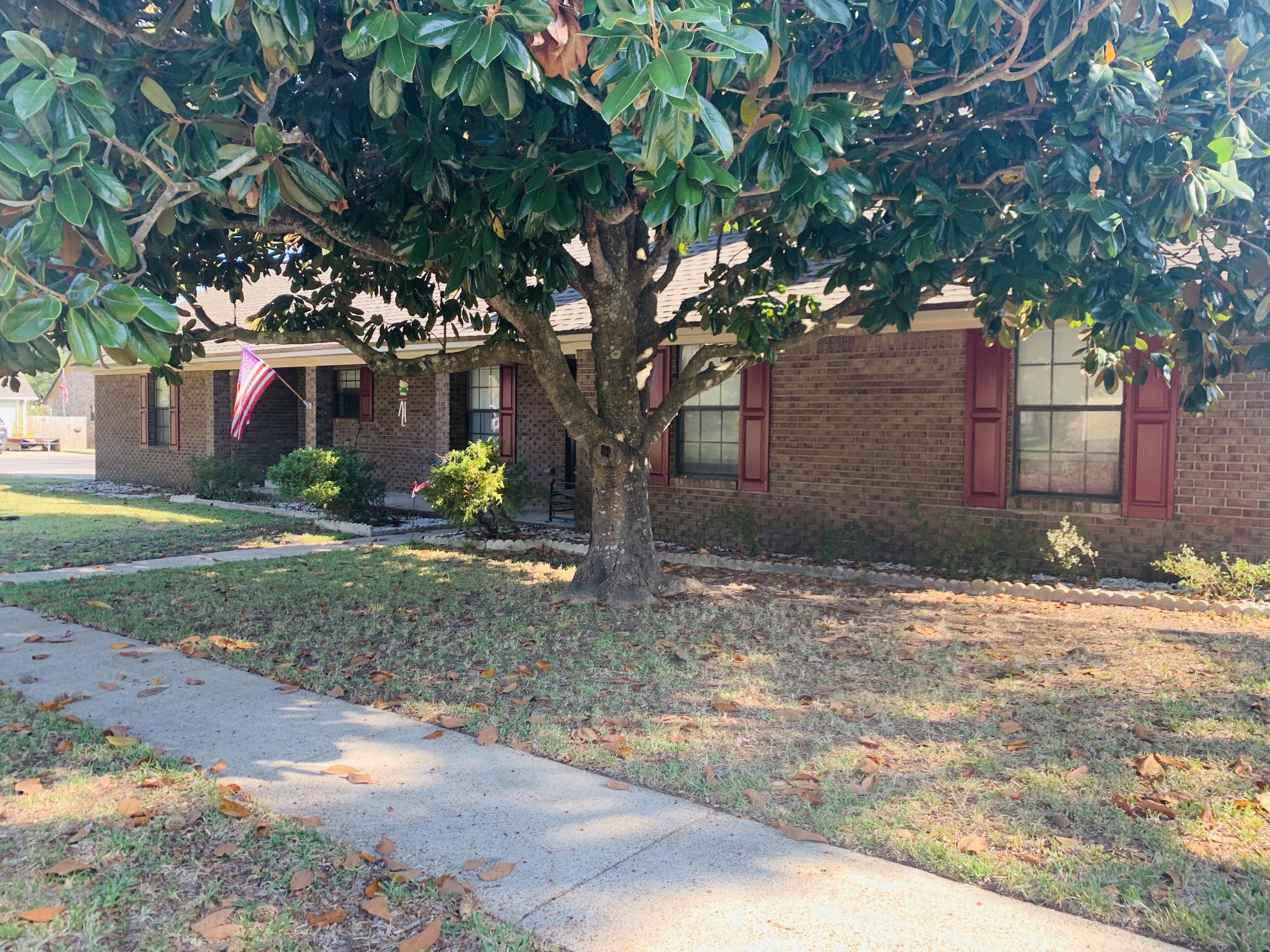 Great brick home close to Destin Elementary, Little League park, Joe's Bayou, Destin harbor and minutes from our beautiful beaches! This home has a nice sized newly fenced yard for kids and pets. You'll find the master bedroom and 2 bedrooms on the main floor. Upstairs boasts a 336sf open space for a 4th bedroom/bonus room/office/playroom. New flooring in kitchen, dining and living room, new tile flooring in master bath, and new fixtures throughout. The garage is heated and cooled and the home is equipped with a whole house multistage UV air purification system. Call today for a showing appointment!