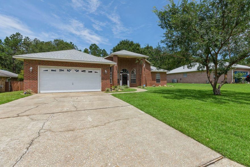 Clean and spacious 3/3 brick home nestled away in the quiet community of Woodside Estates. Open floor plan with updated kitchen featuring refaced kitchen cabinets with modern handles/knobs, newly added backsplash, and new laminate marble looking countertops. The home offers a formal dining room, breakfast nook with large picture window with views of backyard, and a living/office area with french doors. Extra insulation in living room to reduce sound to the master bedroom and princess suite with private full bath. Custom LED lighting installed throughout main living area and kitchen. The backyard boasts great outdoor space for entertaining with a repainted patio frame and new gazebo along with side fencing that was transformed to double door barn style opening for a boat or RV.