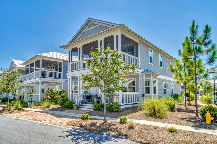 Classic coastal charm defines this cottage nestled within the coveted NatureWalk at Seagrove community! A welcoming front porch leads to double doors that open to a spacious living & dining area with wood floors, shiplap walls, ample natural light, & designer fixtures. The gourmet kitchen features custom white cabinetry, stainless steel appliances, granite countertops including a large center island & a sleek subway tile backsplash. The first level guest bedroom has tray ceilings & an ensuite bathroom. Upstairs, find the spacious master suite with an ensuite bathroom that includes a soaking tub, separate shower and double vanity. Two guest bedrooms with a shared bathroom & second living space complete the second floor. This home includes a one car garage & an outdoor shower for easy