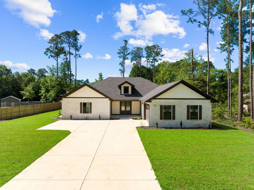 Superb Price For Brick Home w/ No HOA - This Is IT!! Living Room Has 14 ft Ceiling & Multi Slider Doors to Huge Screened Porch. Porch is Tiled w/ TV & Electrical Connections. Large Primary BR. Primary en Suite Bathroom w/ Huge Walk in Closet. Dream Kitchen w/ Gas Cooktop, Large Work Island, Undermount Sink, Samsung Stainless & Black Appliances. Fabulous Granite Counters, Soft Close Cabinets & Drawers. Separate Dining Area Overlooks Green Grass Yard. Lots Of Room For Pool! From LR Is Hallway To 2nd Full Bathroom & 2 Large BR's. A 4th BR Has Separate Full 3rd Bathroom w/ Access to Porch. Mudroom w/ Built In Storage By 2 Car Garage. Large Laundry Room w/ Shelving. Laminate Wood Floors Throughout. Large 0.56 Acre Lot. All This For An Excellent Price in Lagrange Shores of Freeport!