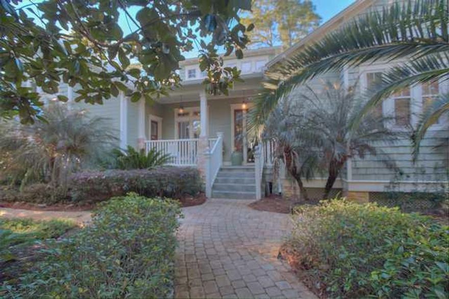 ~~~Your secluded, WATERFRONT paradise awaits you!! If you are looking for the most peaceful, beautiful views of the tranquil pristine waters of Hewett Bayou and Hewett Point flowing into the Bay, this is your oasis. Custom built for his own home by one of the area's top builders, this gem is made for full time leisure living. From the moment you walk in the door, the view over your gorgeous heated pool and spa to the Bay is visible from the numerous glass doors in living, den and master bedroom. Spacious living/dining areas have cozy fireplace for chilly winter evenings. Numerous unique stained glass panels are built in many window/rooms to provide a true ''one of a kind'' residence. 100 yr. old stained glass doors lead into a game room that is filled with everything you need for fun times