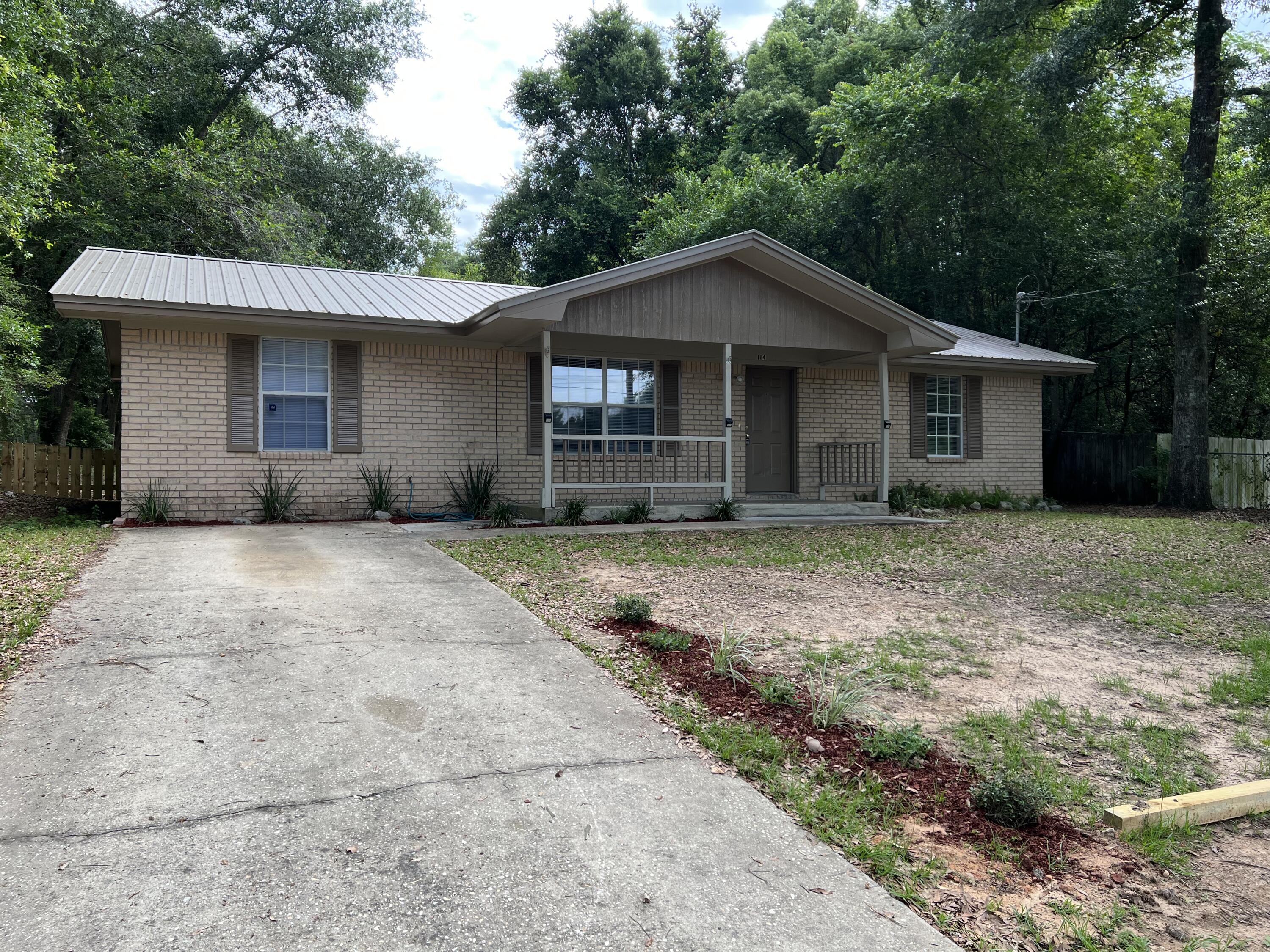 Beautifully renovated 3 bed/2bath home has new paint, new vinyl flooring, new dishwasher and granite countertops!  This home boasts a huge back yard with mature trees!  This home wont last long so apply today!