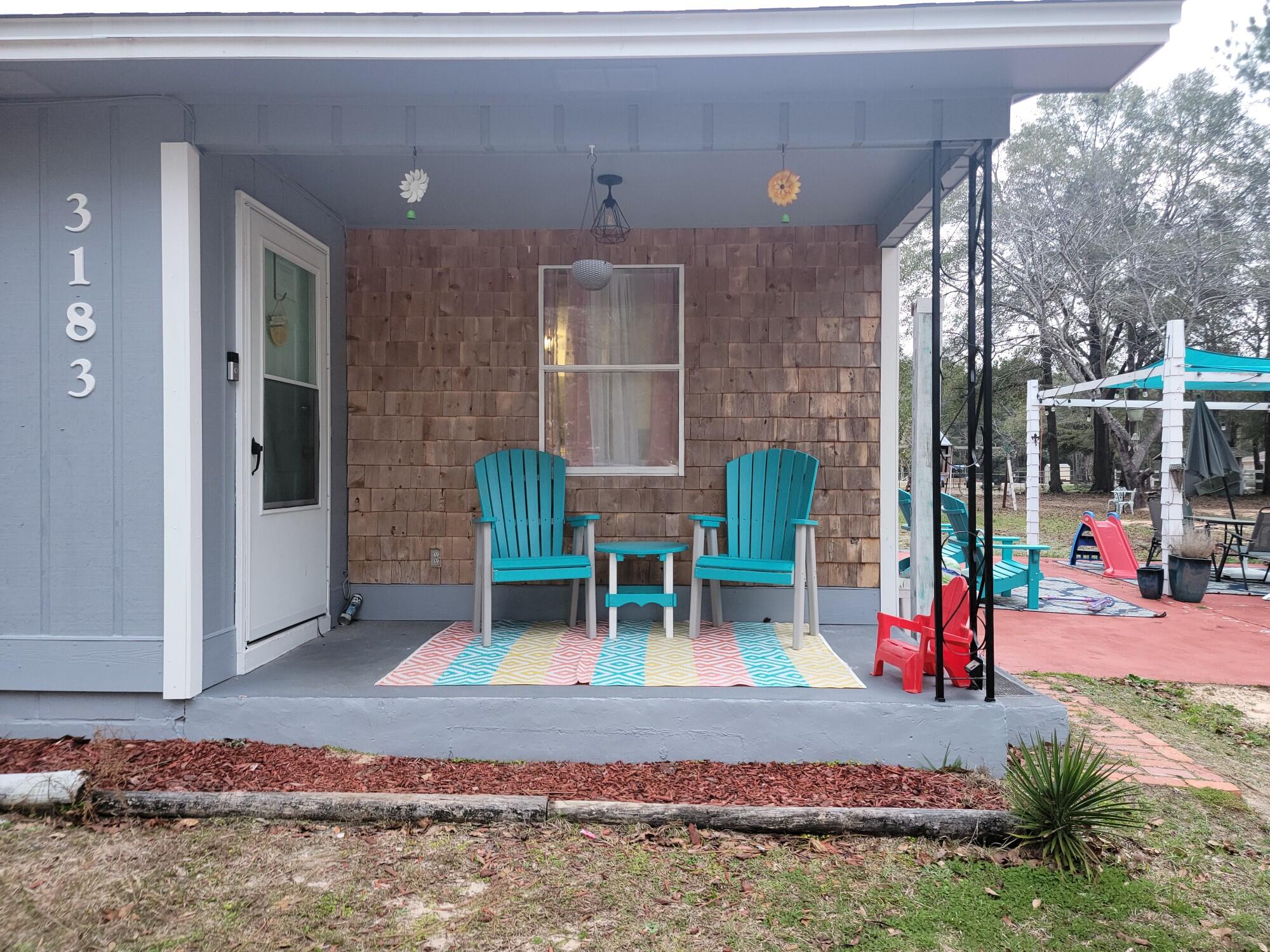 Quintessential Florida 2 bedroom 1 bathroom Florida cottage located in North Crestview on an amazing 1 acre lot.  The home has a great front patio, large living space, open concept dining room kitchen and 2 good sized bedrooms.  A fantastic and over size out building located just out the back door.  Home has a 2020 roof and water heater, new floors throughout, brand new interior and exterior paint and is all ready for you to come on home.  SELLER TO PROVIDE $5,000 TOWARDS BUYERS CLOSING COSTS OR RATE BUY DOWN!!!