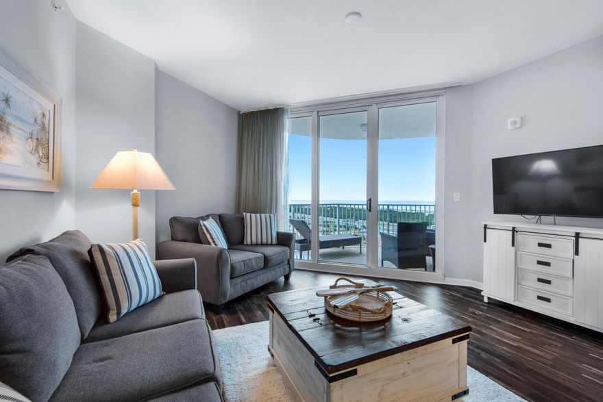 10th floor unit at The Palms of Destin with stunning direct Gulf views as well as Bay views! This unit has has been updated with attractive luxury vinyl plank throughout, and is being sold fully furnished and turn-key ready! Amenities at The Palms are first class. They include an expansive 11,000 SF lagoon pool with waterfall and spa, children's pool, playground and splash pool, lighted tennis and basketball courts, first class fitness center, seasonal shuttle service to the beach, and covered protected parking. THE ASSOCIATION FEES INCLUDE ALL UTILITIES, INCLUDING ELECTRICITY, WATER, CABLE, INTERNET, AND TRASH. Buyer to please verify all information.