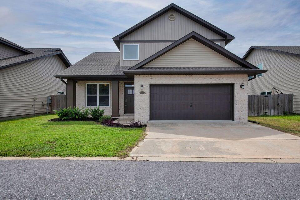 Stunning 3BR/2.5BA craftsman in East Navarre, minutes from Hurlburt Field! Open, light-filled layout with high ceilings, white shaker cabinets, granite counters, stainless appliances, breakfast bar, and versatile office/bonus room. Master suite with walk-in closet, double sinks, and tiled shower. Two more bedrooms upstairs. Luxury vinyl plank flooring throughout. Fenced yard and hurricane-protected windows. Move-in ready--style, space, and prime location all in one!Available Oct 1st 2025
