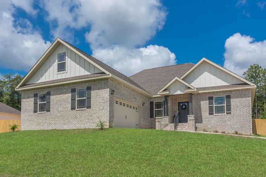 Half Acre lot, 4bd/2ba with flex room. The community has no HOA dues. Custom two toned cabinetry, granite countertops throughout. Full stainless appliance package. This home will has wood look tile in all main areas & bathrooms with carpet in the bedrooms. Kitchen with large breakfast bar island over looks living room. Stacked stone electric fireplace with mantle. Master bathroom will have tiled shower with glass enclosure, large soaking tub, double vanity. Flex room has custom barn doors. 4th bedroom is located upstairs- huge space! Porch ceilings feature custom woodwork on front and back. Added storage area in garage. Bricked entry steps to front porch. Driveway addition to allow for an additional parking pad. Covered back porch, fully sodded yard with irrigation, and privacy fence!