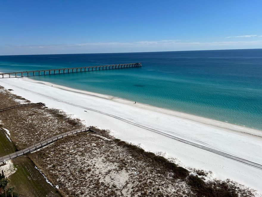 A rare opportunity to own an east side 3 bd/3ba condominium at the Pearl of Navarre.  Unit 1301 is beautifully furnished with stunning panoramic views of the gulf, sound and beach. This spacious unit has many upgrades including granite countertops, wood cabinets, crown moldingand tile flooring.  This condo offers a perfect blend of relaxed charm and lavish amenities.The Pearl amenities include 2 pools, hot tub, fitness room and conference room,  You will appreciate the quality construction and attention to detail.