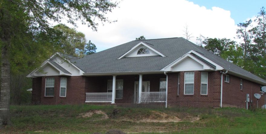 10 Acre, 2899 sq. ft. REO property in Baker! This is a 3 bedroom, 2.5 bath split bedroom floor plan house with a lot of privacy next to Blackwater River Forest! Upon entering the house you will be in the living room, with double french doors straight ahead with views out to the expansive back yard. The formal dining is to your left and a den/office or perhaps fourth bedroom is to your right. The master bedroom is very large with it's own access to the back patio/yard. The master bathroom boasts a large walk in shower and garden soaking tub in front of the front facing window. There is a double vanity and the master closet is extra large and lined with cedar. The second and third bedroom are located on the opposite side of the house with a jack and jill bathroom.