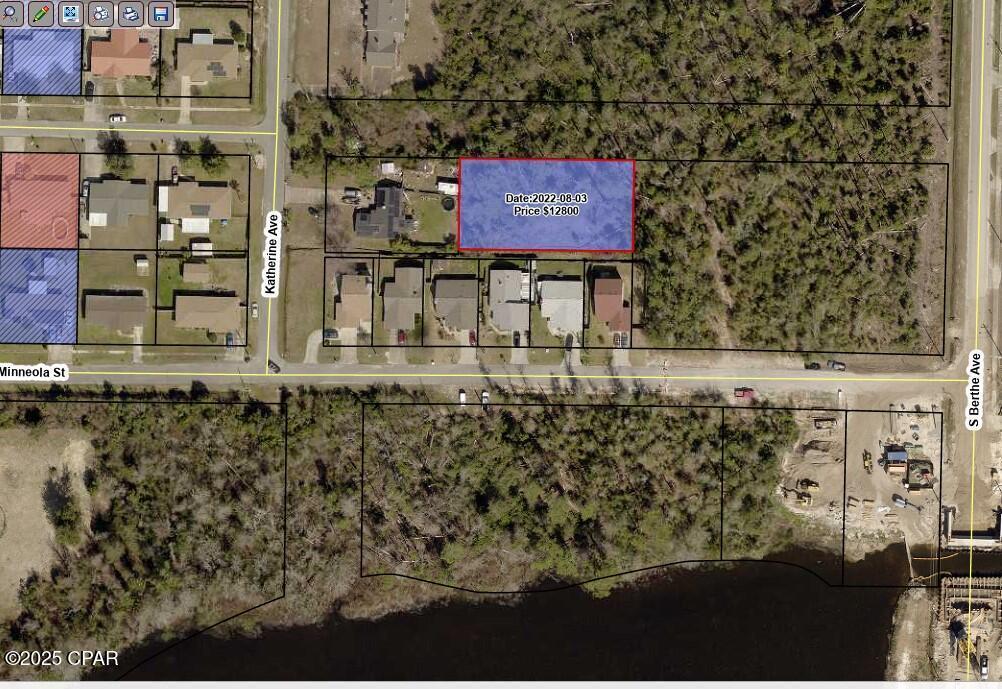 Discover this exceptional .41-acre wooded lot in the heart of Calloway! Situated in Zone X, no flood insurance is required, making it a fantastic investment for builders and developers. This parcel consists of 5 designated lots (8-12 in block 64) and is already zoned for development. According to a recent conversation with the Calloway Planning & Zoning Department, the property may be approved for re-splitting into 4 larger lots with a development order. Additionally, the city will assist with clearing for an easement, making the development process even smoother. Located in a growing area with easy access to schools, shopping, and Tyndall Air Force Base, this property offers incredible potential for a new residential project. Don't miss out on this unique opportunity--contact us today