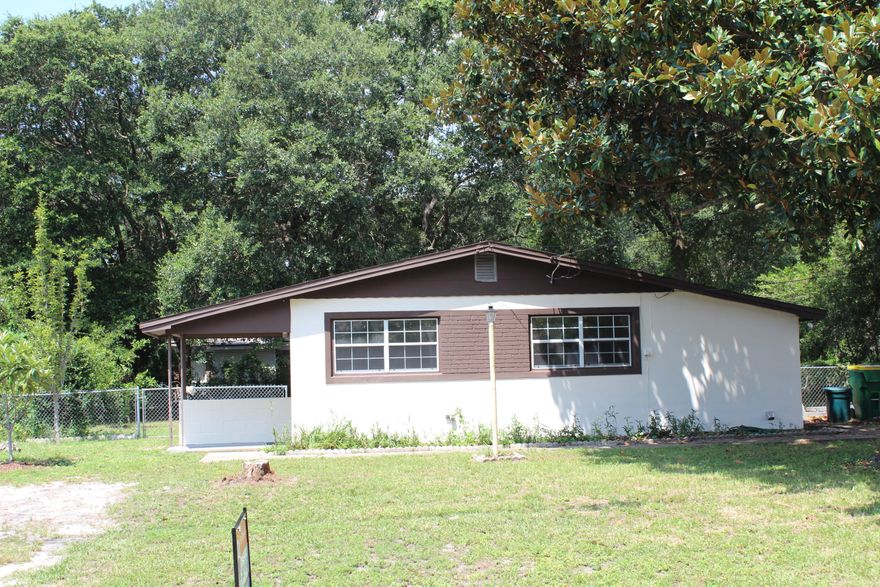 Taking Backup offes. Best bang for your buck. This freshly painted home inside and out has new wood flooring and new carpet in the bedrooms. (Carpet to be laid after 18 Aug) In 2008 the bathroom was remodeled with BathCrest. New kitchen cabinets and new gray stainless appliances. This is a perfect starter home of rental.The yard has a large magnolia tree in front with an orange, pear, (both producing) and Loquat tree. The back yard is fenced with lots of large trees for shade. A large rosemary bush for all those who love to cook. There is a sprinkler system and lawn pump. A 9x13 shed does convey. The AC and garbage disposal are BRAND NEW. The windows were replaced in 2008. The home is ready for a new owner with quick occupancy. This is a home ready to move in with nothing to do.