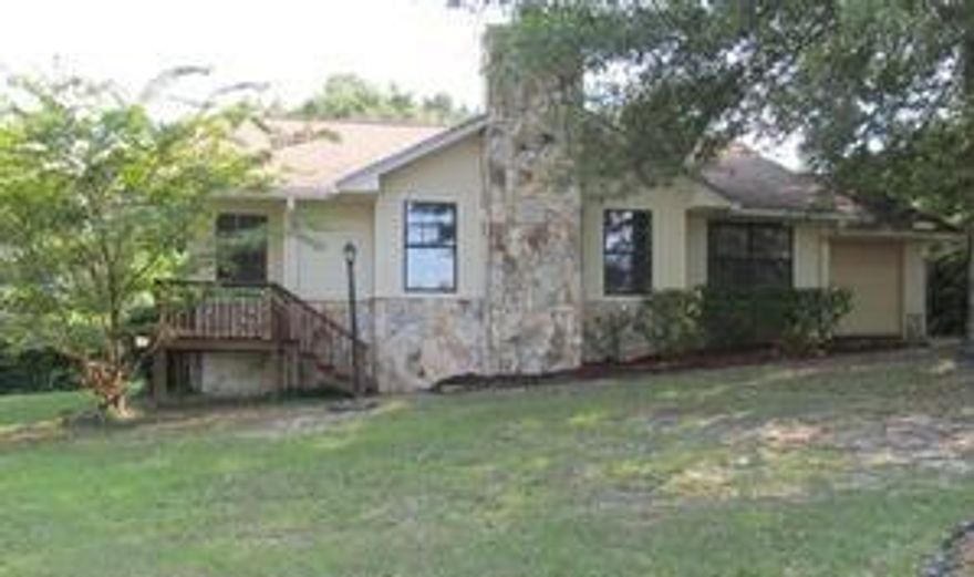 Priced to sell NOW! Affordable home without city taxes!!! The owner has the finishing touches to recent updates all the walls are freshly painted. Tongue-n-groove pine accents the cathedral ceiling in the Living Room, along with the stone fireplace. The garage has been partially converted to an extra room, new carpets installed in bedrooms. Privacy fenced back yard is great for your little ones to play or for the 4 legged members of the family.