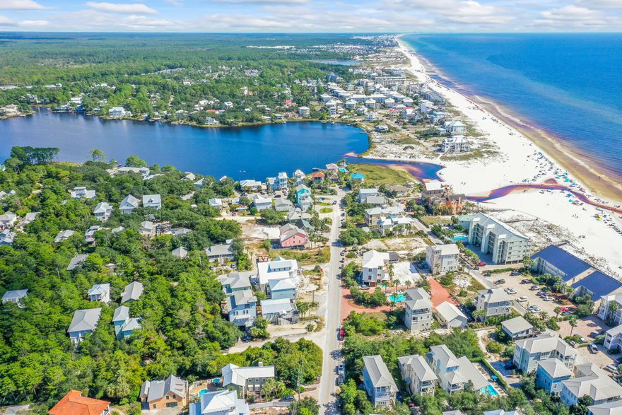 Generously-sized porches and balconies on both levels of this Seagrove Beach home make it live much larger than its 1,586 square feet. A three-bed, three-bath retreat, this home sits in a quiet neighborhood with close proximity to the beach, making it an ideal primary or secondary home or rental investment. The first floor boasts a spacious living, dining and kitchen layout with one bedroom and tile flooring throughout, while the second floor is host to the owner's suite and an additional bedroom with carpeting throughout. Williams Street is conveniently located near beach access 0.2 miles away as well as Eastern Lake for your favorite water sports and near Scenic Highway 30A and its boutiques, restaurants and entertainment. Property is being sold AS IS.