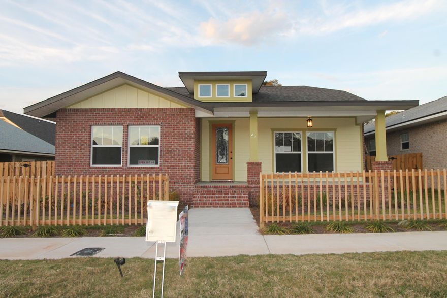 Introducing ''Temple Park at Port Dixie'', a 40 lot development is Shalimar with both underground utilities and broad sidewalks. 9th. Avenue offers wide streets, off street parking for visitors and guests, and homes with rear entry garages. This 3/3 custom brick home has a very welcoming large covered porch. There are 10 Ft. ceilings w/ impressive crown molding, LVP flooring throughout most of the home, tile in the master bath, and 5 1/4'' baseboard throughout. As you enter the home through the covered front porch, the formal dining room is on your right.