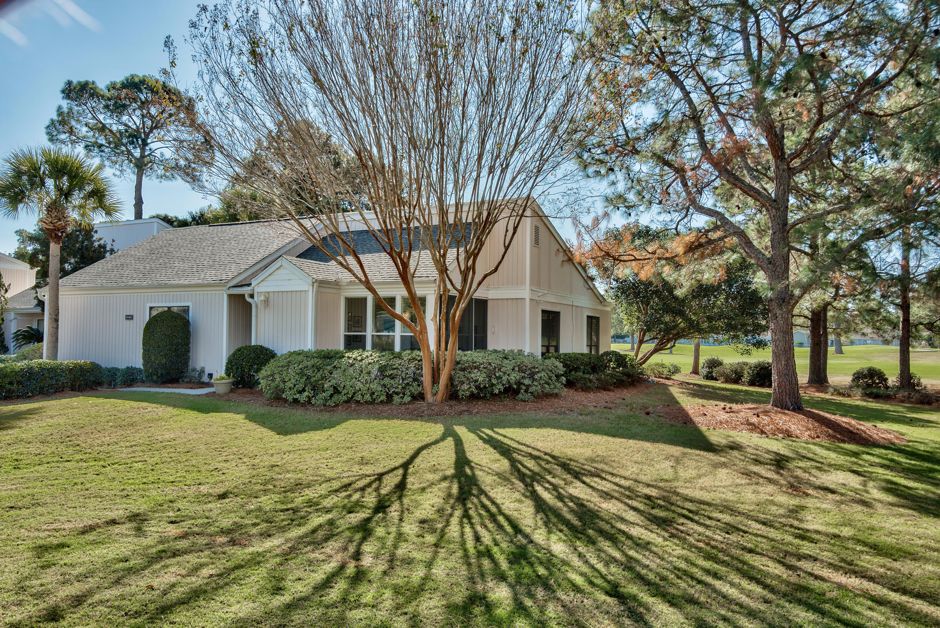 TIRED of DARK, DREARY & DATED CHOICES? This Classically Coastal, Beautifully Renovated unit is waiting for you! Expansive golf course views & outdoor space, large open floor plan, extra windows, sunroom & custom designed kitchen are just a few of the features that makes this home unique. Never a rental, this home comes fully equipped with quality furnishings, electronics & housewares. Rental ready but the HUGE storage room above the sunroom makes this a great second home or even a primary residence. Bikes & golf cart mat also convey. Enjoy the freedom of a Lock & Leave free standing house in a condo assoc. that takes care of everything. Single story Sandpiper units rarely come on the market. VALUE PRICED! Don't miss your chance to own a piece of the Sandestin Paradise.