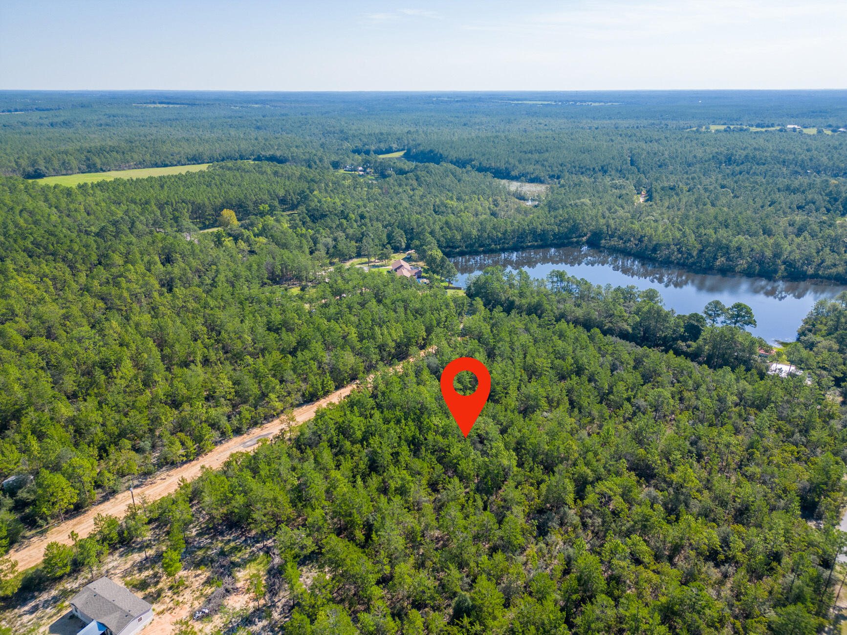 0.45 of an Acre Vacant Lot High and Dry, Non-Flood Zone. GREAT LOCATION! Mobile homes are allowed with No HOA Fees! This spacious lot offers convenient access to major highways (HWY 90, I-10, 285, and 331). HWY 90 is just under 2 miles away, and the DG Market Store is less than 4 miles away. Located approximately 12 miles from essential amenities like hardware and grocery stores, schools, downtown, and the historic Lake DeFuniak, this lot offers both convenience and tranquility.