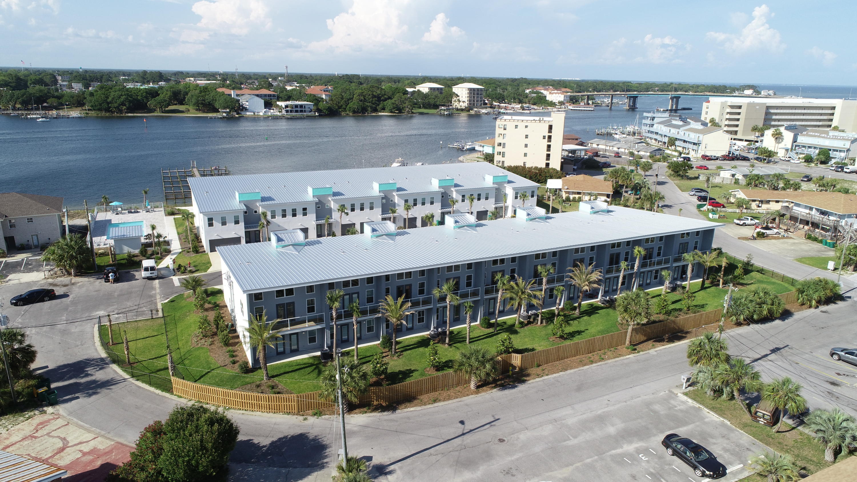 NEW CONSTRUCTION!!! Sound Side Lofts, your new waterfront development. This project is comprised of 20 units with modern and lofted ceilings over looking the intracoastal waterway. Situated in a quaint golf cart community, these town homes each boast their own boat slip, garage, and upscale finishes. Located within walking distance to the world famous white sand beaches, and a short boat ride away from the world famous crab island. Come and relax at the new Sound Side Lofts and experience what this destination has to offer. This unit will be in the second phase just off the water.