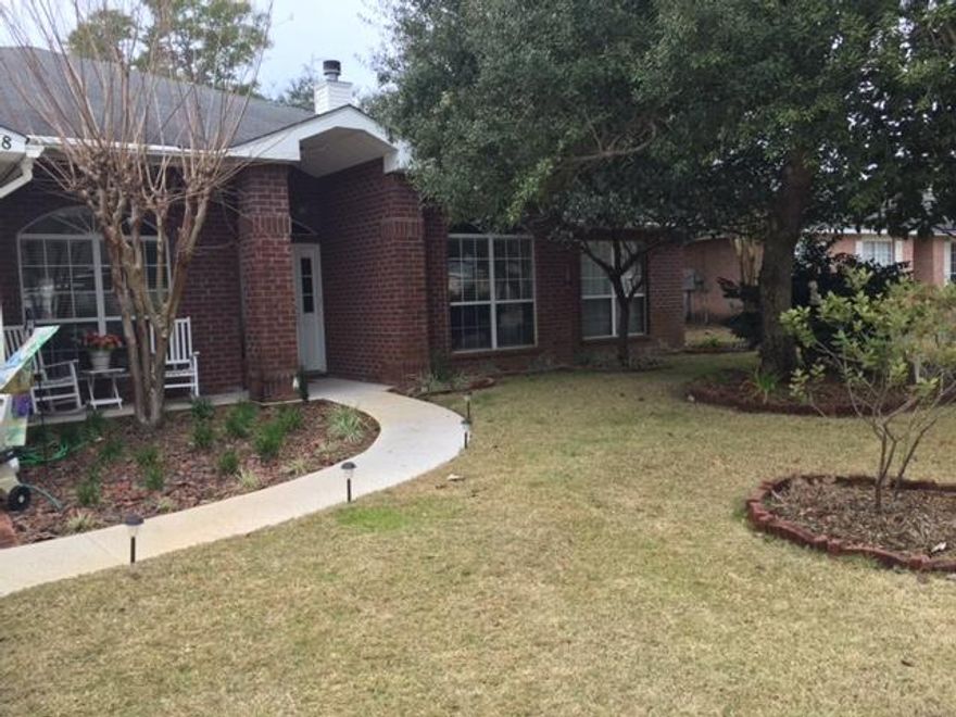 Stunning home close to shopping, dining, land/water recreation, this home is the best of Bluewater Bay without HOA fees. A classic brick home enhanced by manicured landscaping, and private backyard. Attention to detail from the curb; with a brick edged driveway and inviting porch waiting to receive you. Beautiful honey colored, plank flooring fills the living spaces with ceramic tile in wet area and carpet in bedrooms. Creamy cabinetry, brushed hardware, and seamless Corian countertops accompany a center island kitchen with breakfast room. The master suite is a retreat with a private entrance to the back patio, his and hers closets and oversized jetted tub. The split floor plan offers plenty of privacy. So much more to see so don't dawdle or you will miss this truly beautiful home.