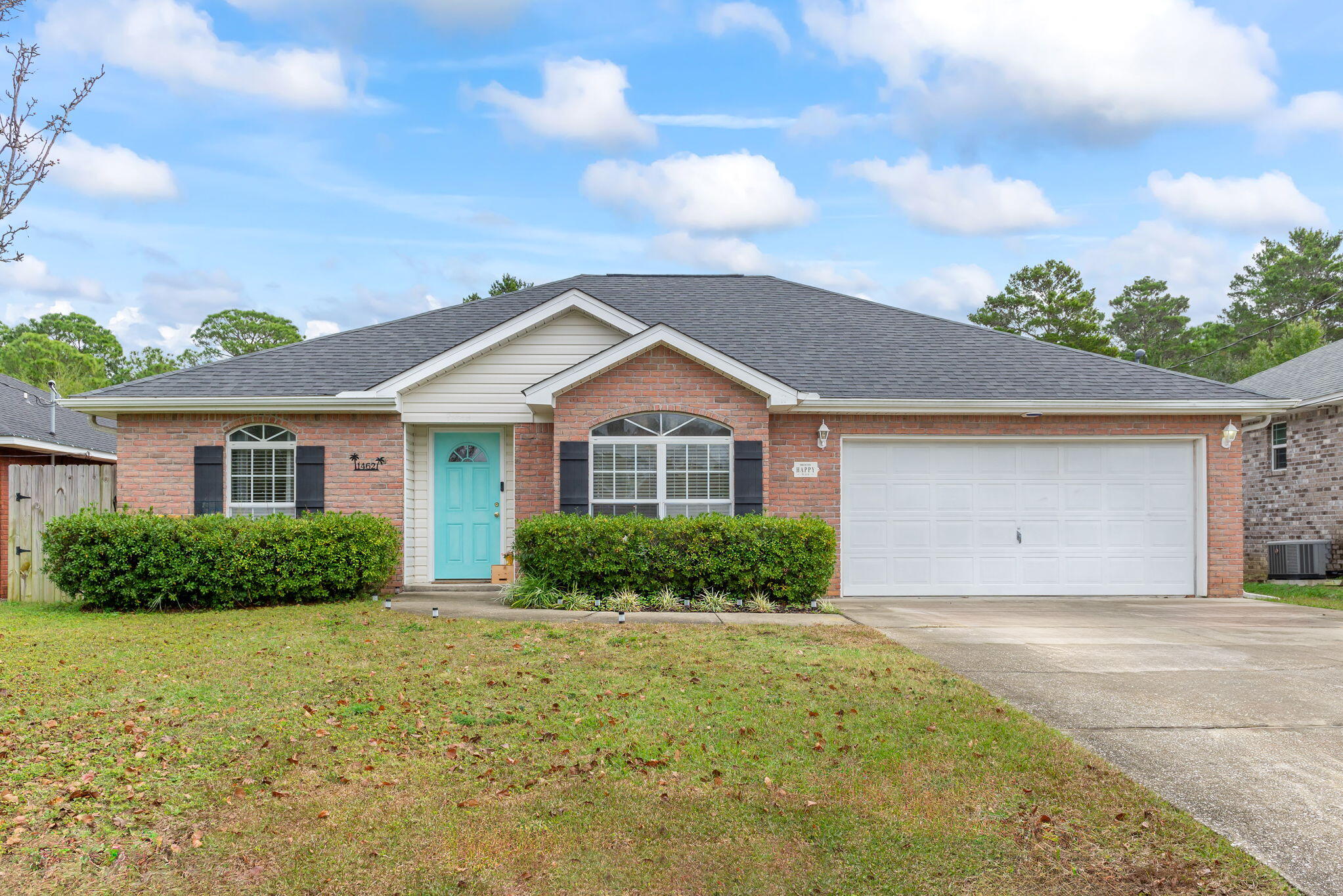 This endearing, traditional home has been lovingly cared for and is just as adorable as it is quaint! Roof 2020, HVAC 2017 Hot water heater 2023. Set in a friendly, integrated street, you'll enjoy a peaceful home life. As you approach, you'll notice the inviting shutters and painted front door that add tothe homes wonderful curb appeal. You're welcomed to the interior by a pleasing foyer. To the right you are led into the brightkitchen and adjoining dining room space. In the kitchen you are surrounded by an array of white cabinetry, new granitecountertops, newer stainless-steel appliances, and pass-through that overlooks the living room area. The neighboring diningarea is the perfect space to enjoy your morning coffee or breakfast as you sit beneath the large picture window overlookingfro  to the attached two car garage and washer/dryer hookups. The family room is avery open and airy with a ceiling fan, peaked ceiling, and abundance of natural light filling the room from the large slidingglass window leading to backyard. You will enjoy large gatherings all year long with friends or loved ones in the bountifulliving space. The split floor plan is fantastically ideal for guests and owners alike! The master is found off the living room onright of home. The master suite features great natural light, ceiling fan, and a substantial walk-in closet. The adjoining masterensuite involves double vanity sinks and shower/bath combo. The remaining two guest bedrooms can be found down thehallway on the left side of home that share a full bath in-between. Both guest rooms are satisfying for any owner as they bothcontain ceiling fans and great closet space. The hall bath features a shower/bath combo and compact vanity. The backyard ismost practical as it requires little upkeep and features a cute, covered patio space that is a wonderful place to relax and staycool on the hot Florida days. Enjoy BBQ's and downtime amongst the fully fenced yard!