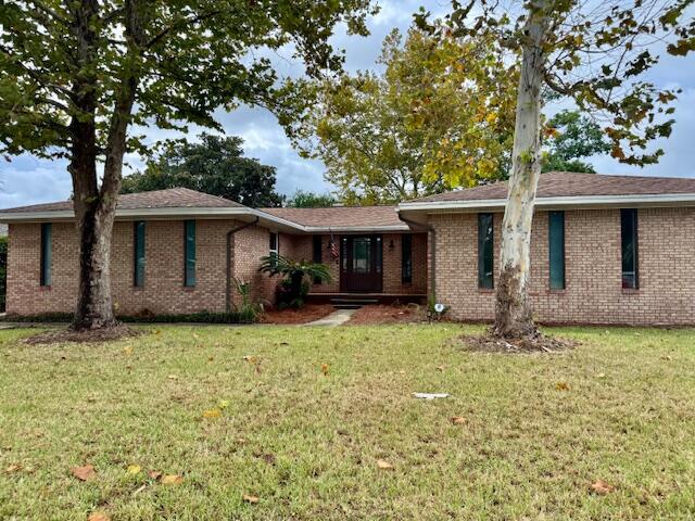 Welcome to this completely remodeled 4-bedroom, 2-bath brick home in the heart of Destin! The open floor plan features a cozy living room with a brick fireplace and a beautifully updated kitchen with stainless steel appliances, quartz countertops, and a kettle faucet over the stove. A versatile walk-in pantry can also serve as a home office or craft room.Bathrooms showcase shiplap ceilings and skylights for natural light, while the brand-new LVP flooring and barn doors add modern charm. Relax year-round in the large enclosed porch with heating and air conditioning. The spacious fenced backyard and unique rear-entry garage provide privacy and convenience.Minutes from the Destin Harbor, shopping, restaurants, restaurants, schools, beaches, Hurlburt Field AFB, Eglin AFB, NAV School EOD