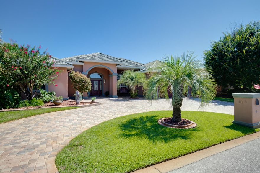 A must see home! Custom built by Boswell Builders of Destin in the prestigious gated golf-community of Emerald Bay, this remarkable 3 bedroom, 2.5 bathroom home, overlooks the 5th fairway and lagoon of this stunning golf course. This open and airy floor plan features a large kitchen with granite counter tops which overlooks 2 large living areas and spacious dining room. A marble fireplace with cozy, gas logs in the living room, built in shelves and cabinets lining the dining room walls, along with high ceilings, crown molding and plantation shutters combine to create a beautiful living space perfect for entertaining. The amazing enclosed lanai & pool provides more space for family or guests to enjoy. The master bedroom and bathroom are a private sanctuary