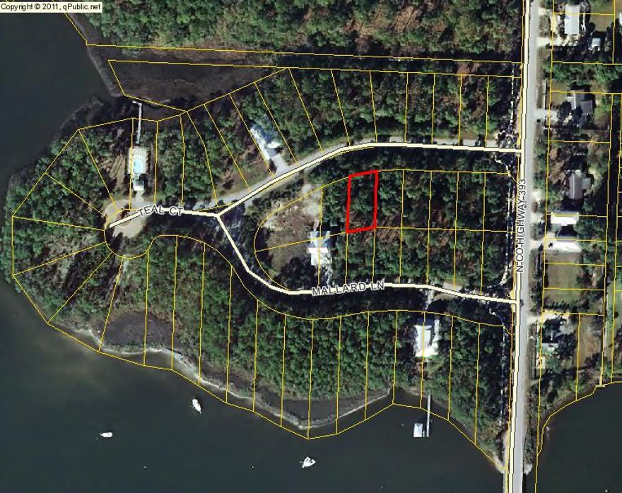 Build your dream home with water views! Lot located just across the street from the bay in this horseshoe shaped, private, double gated, 49 lot community. Water & sewer taps paid - a $9,000 value! Amenities of neighborhood include the private community pool and recreation area as well as boat dock- great for fishing! Public boat launch available at Cessna Landing Park. ***Buyer is responsible for personally verifying details about this property. All information contained on the listing is believed to be accurate but not guaranteed. ***