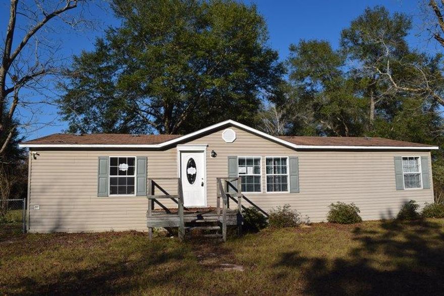 REO spacious manufactured home located in the Paxton area. Kitchen features an island plus 2 pantries. All bedrooms have walk-in closets. Master bath has double vanities, garden tub and separate shower. Decks on the front of home as well as back. Great home in the Paxton school district.