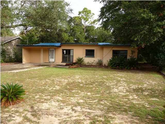 House needs a lot of work, roof is falling in and has water damage. Good location, Close to schools, close to Eglin AFB.''Enter at your own risk'' and all buyers wishing to view interior must sign a Hold Harmless addendum. Buyer to pay all closing costs; seller will not pay for title insurance.