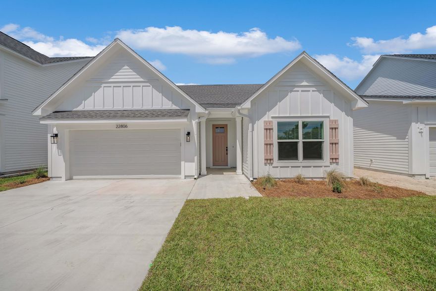 MOTIVATED SELLER!!! Huge price drop! This property appraised for $558,000 just a few weeks ago! Do not miss out on this GREAT deal! This home is the Flounder Plan with 3 bedrooms and 2 bathrooms with approximately 1,653 sf of living space and an attached 2 car garage. This home has a white vinyl privacy fence enclosing the backyard, flood lights, a fiberglass entry door and impact windows on the exterior. The interior boasts crown molding throughout, Revwood flooring in all living areas, tile floors in the bathrooms and laundry and carpet in the bedrooms. The kitchen includes plenty of white shaker cabinets, pantry, all stainless steel appliances including the refrigerator, a large island with cabinets and the upgrades to the kitchen include Silestone Quartz countertops and a white enamel farmhouse style sink. The living area has upgrades to include dimmer switches on the LED lights and a floor receptacle for convenience. The master bathroom has a walk-in tile shower with glass doors and a nice size walk-in closet. This home has plenty of windows and lots of natural light. It is also located just down the street to the Lake Powell public boat ramp, just across the Inlet Bridge from 30A and just a 10 minute walk to the sugar white sands and emerald waters of the Gulf of Mexico. Come make this beautiful custom built home your own. Verify measurements if important