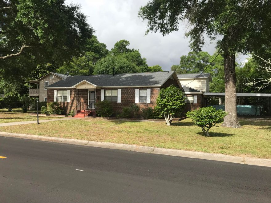 Very large, well maintained corner lot home in a fantastically located area. Near Eglin AFB, this home features hardwood and carpet  flooring. Two bedrooms and two full bath are located downstairs with an additional two bedrooms and one full bath upstairs. Large separate formal dining room with a breakfast nook in the kitchen. Small fenced in yard with a covered patio. Large separate garage off of the spacious carport. Call to see today!