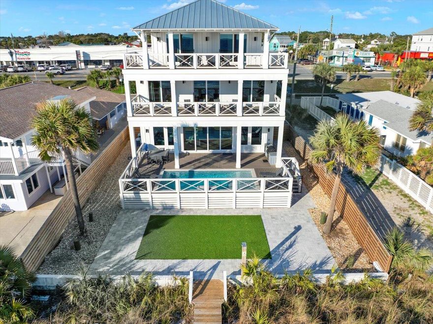 Looking for the right Gulf Front Beach House, you just found it in this Majestic New Beach House. Already on rental with 30aescapes and its name says it all, the ''Jewel of Oleander'' booked over 540,000.00 in its very first full year in 2025.  The first-floor features, 12' ceilings with a first-floor bedroom with Ensuite bath, large Kitchen and Dining Rooms, Game Room,  a Great Room that opens up with a 18' folding/sliding glass door to a Covered Lanari with cooking station, an oversize pool and deck along with another large deck for large functions and as well a beach walkway. The second-floor features 4 bedrooms of which 2 are gulf front and a large bunk room, all with ensuite baths along with a Gulf Front viewing room and a laundry.  The Third-Floor features 2 gulf front Master Bedroo with oversize Master Baths, a Living Room and a Bunk Room along with a large Owners Closet.  This beautiful home designed to sleep 36, has plenty of break out space inside as well as outside with three large decks, oversized pool, outdoor kitchen with audio on every deck with plenty of parking for up to 9 cars.  