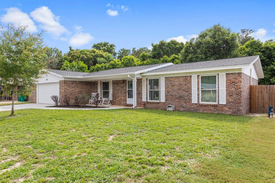 Hidden gem in the heart of Niceville! Don't miss this completely renovated all brick home. Highlights of this home feature an open kitchen and living area great for entertaining, soft close cabinetry, quartz countertops and stainless steel appliances. Additional attributes include updated flooring throughout, new lighting, window treatments, hardware, bathroom vanities-the list goes on! The spacious and fully fenced-in backyard also boasts a screened in patio for additional living space. This home has it all in a great community-call today for a showing!