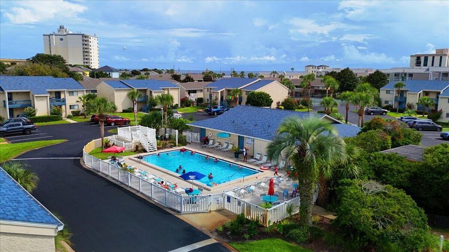 Ideally located off Iconic Scenic Hwy 98 with no through traffic, this condo is in the perfect spot to enjoy everything Destin and Miramar Beach have to offer. Less than 500ft from the gated deeded beach access of the emerald waters of the gulf. Not only is it ready for immediate occupancy and relaxation but also shows a remarkable rental projection of over $22K. Residents can enjoy a tranquil home environment yet be within a two of miles of dining, shopping and entertainment spots of Destin, making this property a perfect blend of relaxation and rental income potential. This fully furnished condo features tile floors, stainless steel appliances, granite countertops, a lockable owner's closet, a breakfast bar, and pool views. Conveniently located on the ground floor right across from the pool which also means you will not have to worry about pesky steps.  Additional upgrades include a 2022 A/C unit, 2022 hot water heater, a newer full-sized washer & dryer, new sleeper sofa with a matching loveseat. The roof was replaced in 2022. The covered patio is accessible from both the living area and the bedroom. This unit comes with 1 assigned parking spot right in front of the unit and several other parking spaces available.

Chateau La Mer, a 12-acre condo community located across from the Gulf, offers an array of amenities including deeded beach access, a heated pool, a tennis court, pickleball, playground, a grill area, picnic area, and a clubhouse. Seize the opportunity with this community and everything it has to offer for residents and vacationers.
