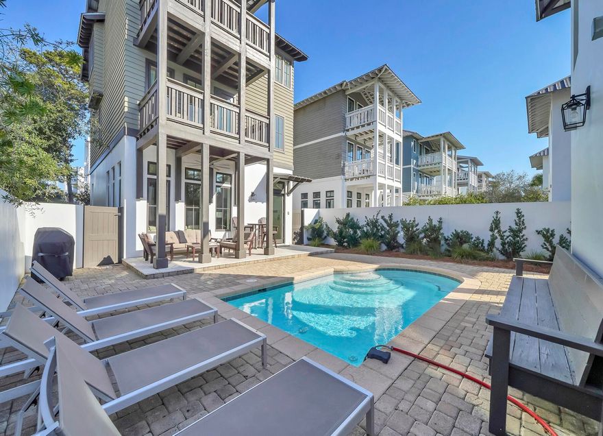 The perfect Inlet beach location in the hottest area of development on 30A. Can you say, no HOA, no new buyer fee yet adjacent to Rosemary and walking distance to the beach and now with the new access tunnel to the shops of 30A. north of 98.The is immaculately kept and finished beach home offers the ultimate in privacy inside the walled courtyard with private pool and outdoor BBQ and lounging area. The carriage house offers a separate quarters for your guests/kids or even separate rental options during the same time frame for vacationers. The home is elegantly finished with the main living and chefs kitchen on the ground floor. Well thought out, designed and decorated bedrooms offer ample sleeping accommodations to fit all types family makeups. Furnished and ready to rent or use.