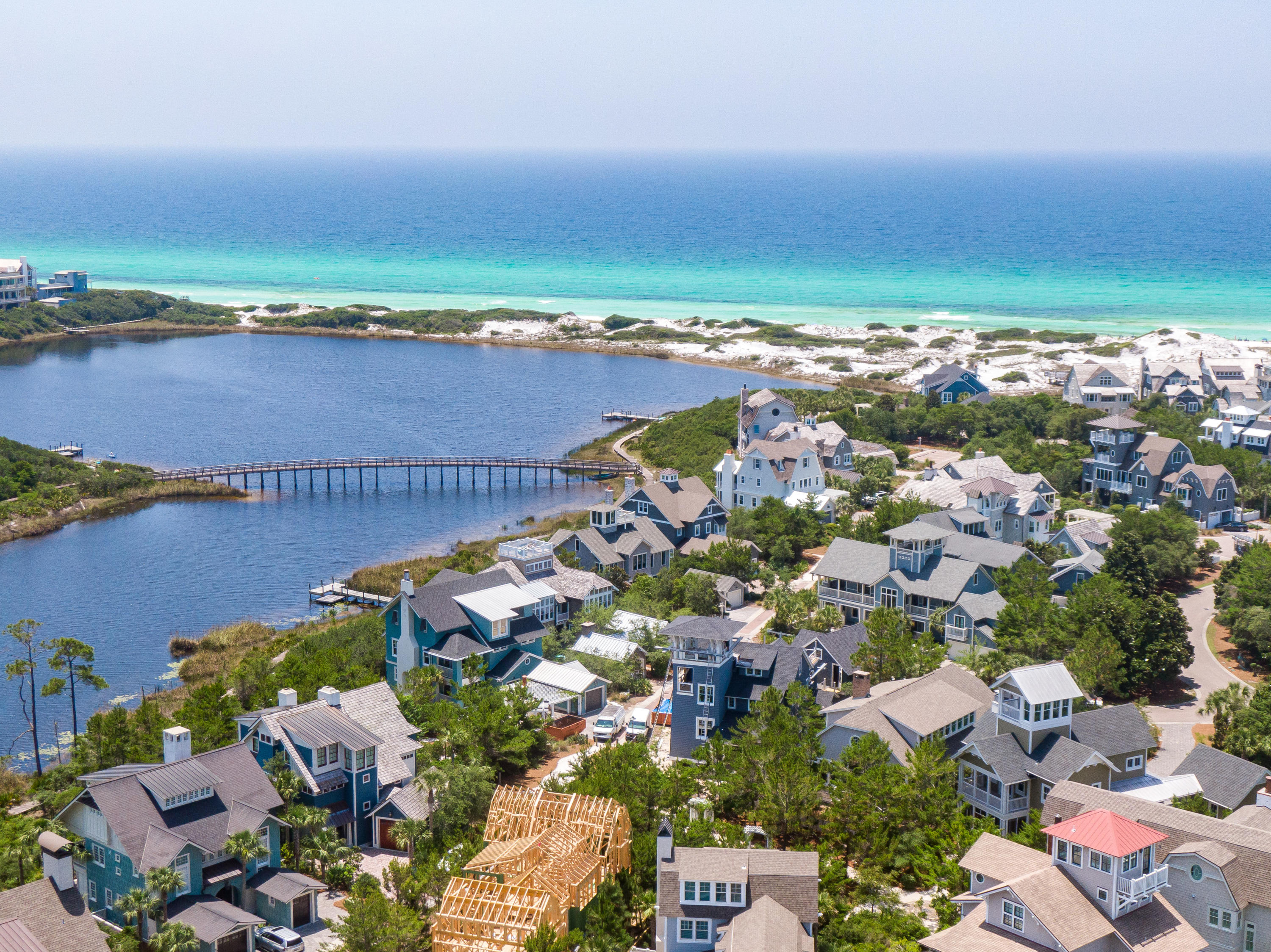 Offering luxurious living for the savvy, discerning home buyer in the Bridges section of WaterSound Beach; this 4-bedroom, 4.5 bath 3,200 square foot home is the perfect balance of simplicity and first class living, privacy and connectivity to the emerald waters beyond the coastal dune walkovers.The residence compliments its surroundings perfectly with such a pleasingly simple design that exudes the same peace and tranquility one enjoys from sitting at the shore and listening to the Gulf of Mexico. A gas fireplace, flanked by beautifully crafted built-ins, graces lofty and open great room where ample seating flows into the dining area with breakfast bar, offering an ideal location for your next family gathering.The spacious gourmet kitchen offers a suite of stainless-steel