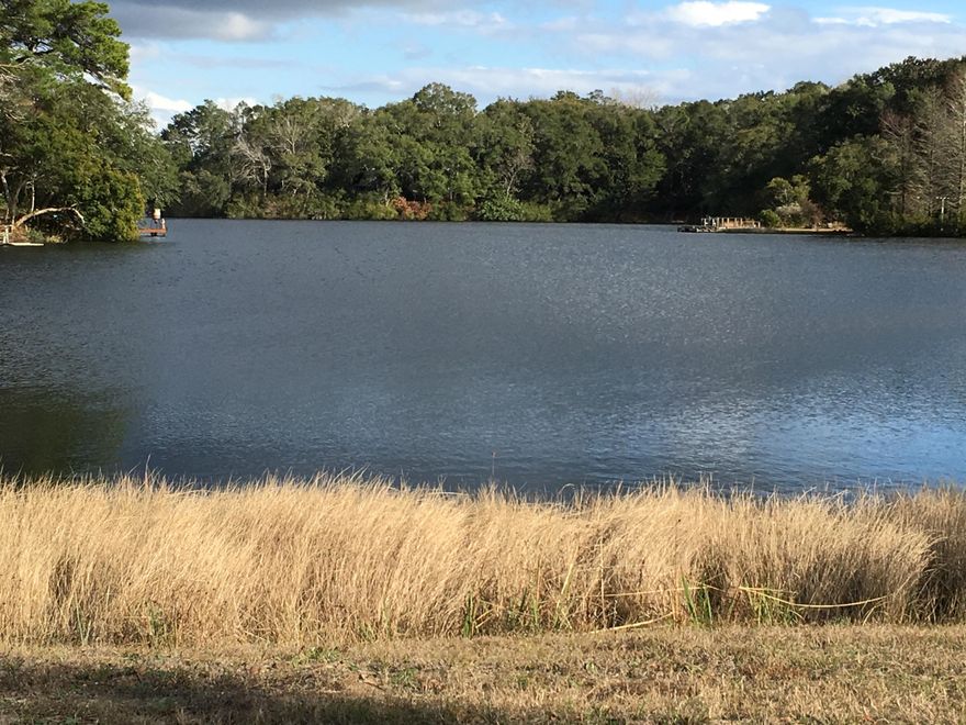 Lake Sharon Estates is a well-kept secret with a 14 acre lake and surrounded on 3 sides by the Eglin Reservation. Very low annual association dues--$125 a year. The lake is well-stocked with bass, bream, & huge catfish. As a lot owner you are given access to the lake for fishing & boating (non-motorized). A peaceful, country setting yet you are only 3 blocks to the bay-side public park & boat ramp, 5 minutes to Bluewater Bay, & just 15 minutes to the beaches in Destin. A true sense of community is evident & you will want to make your home in Lake Sharon Estates.