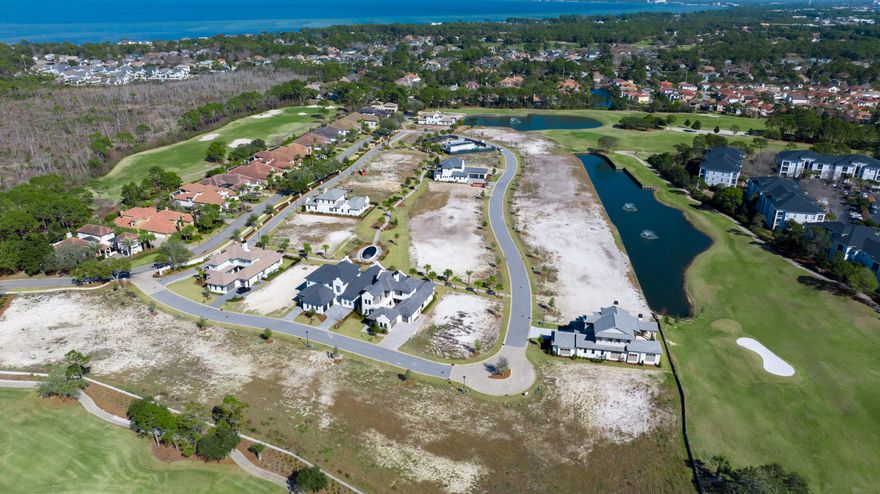 Less than a mile from the beach! Build your dream home in one of Destin's most desirable golf communities! The homesite (lot 7) is located in Regatta Bay's newest development, TradeWinds. TradeWinds will consist of 54 homesites. Homes will be of a West Indies w/ Dutch influence style of architecture. Owner has the option to use an approved Architect & an approved Builder. Regatta Bay is a quiet, gated, golf & boating community that offers a LIFESTYLE unlike no other! The Regatta Bay Lifestyle is about convenience! You can golf cart to so many fun places in minutes, including the Beach! (See aerial photos) Within Regatta Bay, there is golf, swimming, tennis, pickle ball, park, playground, Regatta Bay Clubhouse, Legendary Marine & Legendary Yacht Club. Click 'more' to continue. Regatta Bay offers a private road that takes residents to the Destin Commons, where you'll find an array of popular men's and women's retail stores, a variety of restaurants, Whole Foods, Bass Pro, Lowes, AMC movie theater and Uncle Buck's Bowling! ALL ACCESSIBLE BY GOLF CART.
