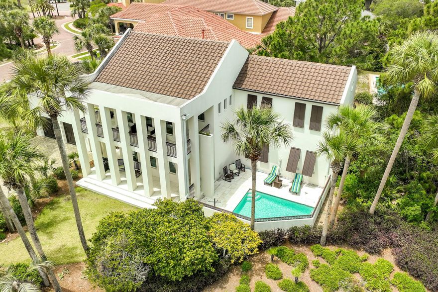 ONE OF A KIND! Gorgeous property located at the South entrance of Destiny East with very close access to the beach! This house is an entertainer's paradise, offering a beautiful private pool, a full wet bar on the first floor, an oversized 2-car garage to store golf carts and toys and a garage rooftop balcony that measures over 400 square feet! This property also features: a master suite on the first floor, entertainment areas in both levels, large second floor balcony, granite counters and stainless appliances in the kitchen, travertine and wood floors, and much more. The house conveys fully furnished and rental ready. Don't miss your opportunity to acquire this property as your 1st or 2nd home or as a vacation rental!