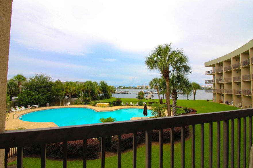 Charming newly updated Waterfront condo with BoatSlip! Quiet location and well maintained. This unit is tastefully furnished and equipped with everything you need along with a spectacular view. Renovations included new tile in the living area, new glass in the sliding patio door, as well as new cabinets, countertops, and fixtures in the kitchenette area. Don't forget about the boat slip with designated water and electric hookup. After an evening of boating come relax on Pirates Bay private beach. The water of the sound is just steps away and the pool is even closer along with convenient charcoal grills. There is also parking for boat trailers and RVs. Don't miss out on this investment. Boat Slip can be rented separately for additional income.