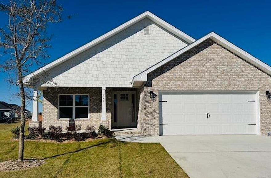 Just 20 minutes from the sugar-white sands of South Walton and 30A, this sought-after Craftsman-style 4-bedroom, 2-bath residence blends timeless design with refined finishes. Upgraded LVP flooring flows throughout the home, while the main living area is enhanced by a dramatic cathedral ceiling and 9'+ ceiling heights throughout. Eight-foot entry doors and quartz countertops add to the home's upscale appeal. The spacious owner's suite offers a generous walk-in closet, creating a true private retreat. Outdoors, enjoy a fully sodded yard with an automated sprinkler system, and the convenience of a garage door opener completes this exceptional home. *Furnished pics are like plan but selections or features may be different than actual home for sale.*